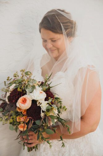 Here comes the bride, Chelsey Hoscheit. The wedding bouquet was designed and made by MaryAnn’s Floral of Caledonia. Photo by Sydnie and Me Photography