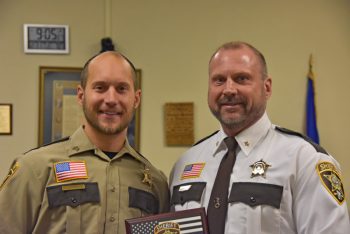 Sgt. Zach Swedberg received a Life Saving Award from Houston County Sheriff Brian Swedberg at the December 31 commission meeting. Photo by Charlene Corson Selbee