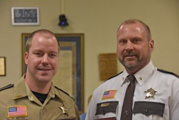 Deputy Ethan Meyer is recognized by Houston County Sheriff Brian Swedberg for his life-saving efforts on November 30. Photo by Charlene Corson Selbee