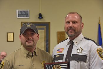 Houston County Sheriff Brian Swedberg presented a Life Saving Award to Dispatcher Pat Molling for his efforts on November 30. Photo by Charlene Corson Selbee