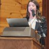 Kara Maloney, who has years of experience with LACC, called the annual meeting to order. Photo by Barb Jeffers