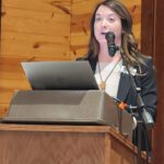 Kara Maloney, who has years of experience with LACC, called the annual meeting to order. Photo by Barb Jeffers