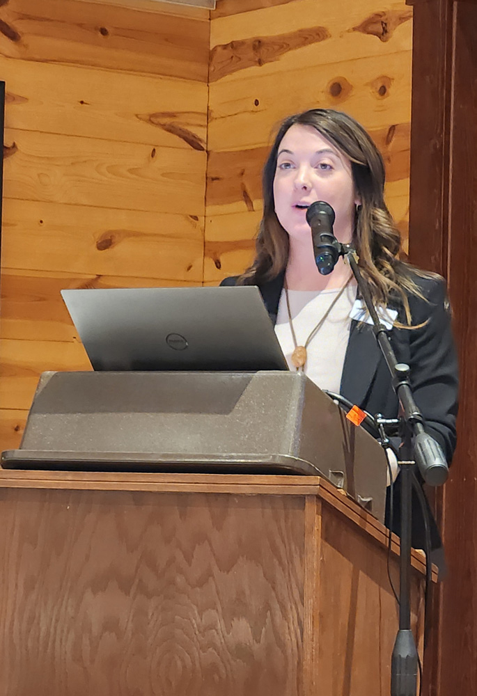 Kara Maloney, who has years of experience with LACC, called the annual meeting to order. Photo by Barb Jeffers