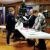 City Clerk Wendy Brincks swears in Ostrander’s new Mayor, Stephanie Start, and new council member, Jimmie Dean. Photo by Zech Sindt