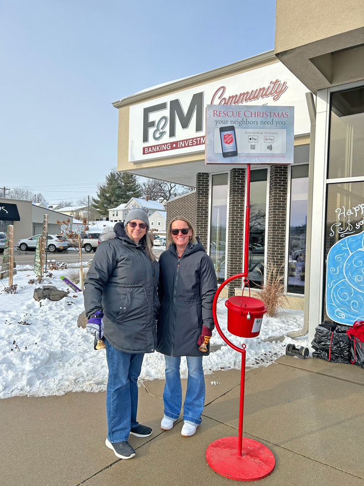 Jade Grabau and Robyn West from the FSA office ringing bells for Fillmore County Red Kettle drive. Photo submitted