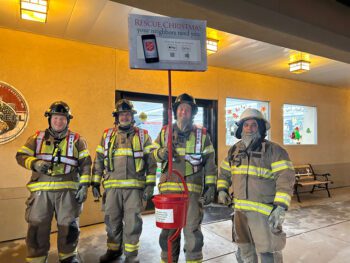 Members of the Preston Fire Department join in the tradition of ringing bells for the Red Kettle drive. Shown are Thomas Roberts, Trevor Lange, Adam Amy and Ramon Hernandez. Photo submitted