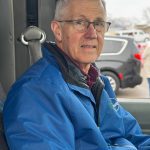 Retired Spring Grove banker Gary Friedman enjoys meeting all the passengers that ride “his” bus. Gary drives for Rolling Hills Transit one day a week. Photo by Charlene Corson Selbee