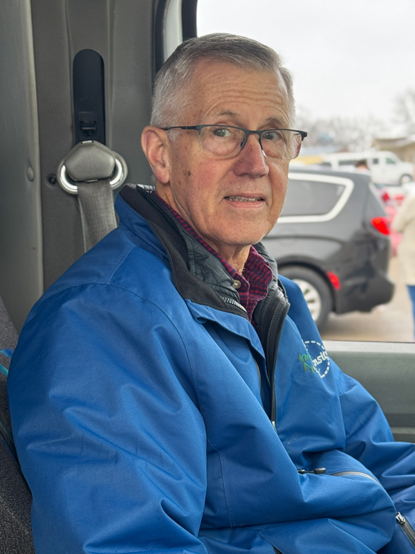 Retired Spring Grove banker Gary Friedman enjoys meeting all the passengers that ride “his” bus. Gary drives for Rolling Hills Transit one day a week. Photo by Charlene Corson Selbee