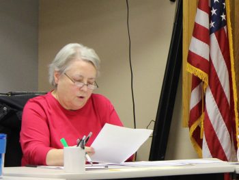 Rushford City Councilor Sally Ryman discusses a new EDA/CEDA program at the December 23 meeting. Photo by Kirsten Zoellner