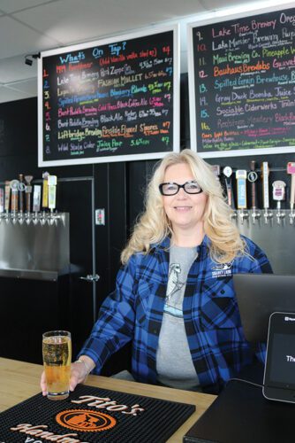 With 16 taps and signature drinks like The Ankle Biter, The Dog Paddle is sure to have something to quench your thirst, as well as treats for your tummy. Owner Kim Radke is appreciative of the wonderful community in the Fountain area. Photo by Barb Jeffers