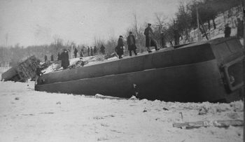 Train wreck between Houston and Rushford with cars partially submerged in the Root River, February 1909. photo courtesy of the Houston County Historical Society Photo courtesy of the Houston County Historical Society