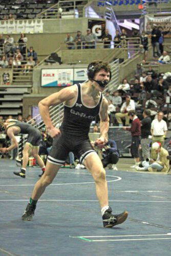 GMLOS’ Cael Smith is pumped after holding on to beat Chatfield’s Hunter Polikowsky in the Section 1A individual semis by 6-5 decision. Said win was huge in getting Smith a trip to state, as a Smith sibling (prior Daniel and Diann) has gone to state six straight years. Photo by Paul Trende