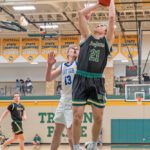 Rushford-Peterson senior Caden Johnson gets free for a layup in the Trojans’ regular season finale 70-53 win over Cotter. R-P won its sixth straight game, and they improved 21-4, and Johnson is the only senior. Photo by Dawn Hauge