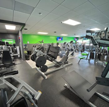 Gym shot of other equipment – treadmills, stair climbers, ellipticals. Photo by Wanda Hanson