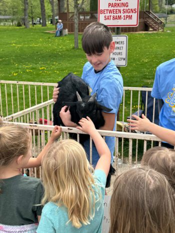 Teague Tessum sharing info about his goats with Lanesoro students for Ag Day. Photo submitted