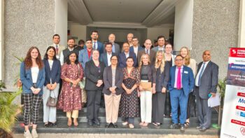 The International Conclave gave the students a chance to interact with many business leaders. Area students shown are Malia Tessum, fourth from the right in the front row and Emma Illg, second from the right in the second row. Photo submitted
