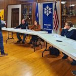 Logan Dior from Midwest Machinery in Grand Meadow presents a proposal to Ostrander City Council for a new John Deere Z930M ZTrak mower. Photo by Zech Sindt