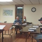 Clockwise from left, Peterson Public Works’ Chris Grindland, Acting Mayor Tracy Seelbinder, and Councilors Kristina Grindland and Justin Simon. Photo by Kirsten Zoellner