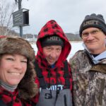 Some of the organizers of the Lanesboro Memorial Ice Fishing Tournament. From the left: Melissa Wagner, Brad Kelly and Erik Overland are all smiles during the 2025 tournament.