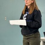 Marg O’Laughlin addressed the board during the public comment period to share her concerns regarding the curriculum in her ninth grade daughter’s literature class. Photo by Wanda Hanson