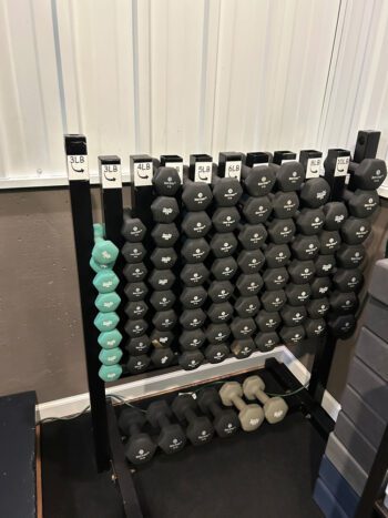 The weights used in barre and Pilates classes are relatively small; repetitions are emphasized in these classes. Photo by Wanda Hanson