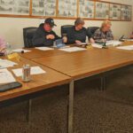 Kati Lentz from Smith Schafer CPA firm reviews the city’s annual audit with Wykoff City Council. Photo by Zech Sindt