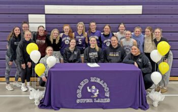 Grand Meadow senior Lauren Queensland has signed a letter of intent to play college basketball at Gustavus Adolphus. Queensland is surrounded by her teammates and coaches including dad Ryan Queensland. Her mom is Susan and her two older sisters Riley and Kendyl were also standouts for GM, as the Queensland era has ended for Lark basketball. Photo submitted