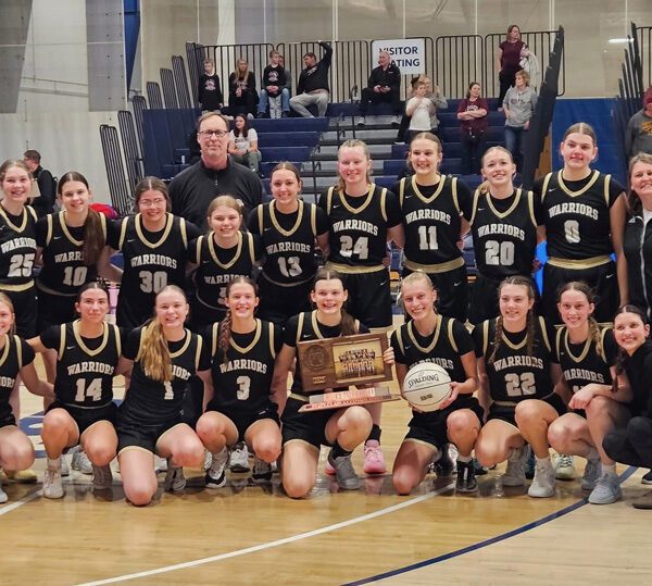 Caledonia girls basketball ended its amazing season by going 2-1 at the state tournament, winning the consolation bracket, taking fifth place. The team’s only two seniors, Josie Foster and Sienna Augedahl hold the trophy and ball. The Warriors finish at 29-4. Photo by Sara Klug