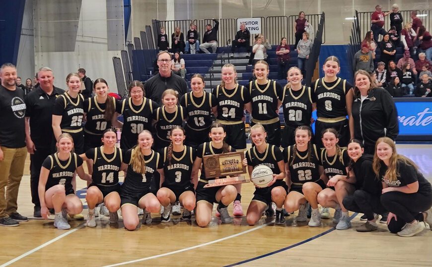 Caledonia girls basketball ended its amazing season by going 2-1 at the state tournament, winning the consolation bracket, taking fifth place. The team’s only two seniors, Josie Foster and Sienna Augedahl hold the trophy and ball. The Warriors finish at 29-4. Photo by Sara Klug