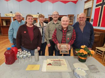 The Holt Township Board recognized Philip Abrahamson for 60 years of service as treasurer of the board of directors. Back row from left: Don Ruen, Carolyn Freese and Loren Berge. Front row from left: Chris Gudmundson, Philip Abrahamson and Karroll Gudmundson. Photo by Barb Jeffers