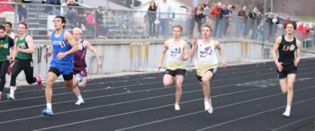 RPH’s Caden Mattson (far left), Chatfield’s Alden Pearson (partially occluded), Caledonia/Spring Grove’s Owen (left) and Eli (right) Staggemeyer, and LFCMC’s Adrian Rindels compete in the final heat of the boys 100-meters at the RPH Meet. Cotter’s Ezra Burros took first with Eli, Caden, Owen, Adrian, and Logan finishing two thru six. Photo by Paul Trende