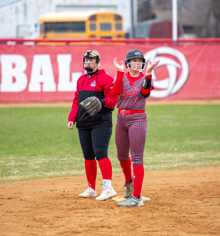 Houston’s Claire Frauenkron stands approvingly at second base in the Hurricanes game with Alden-Conger/Glenville-Emmons. Team double-H, with a plethora of girls contributing, is off to a 4-0 start to the SEC season, a 6-1 overall start. They are ranked #6 in Class A. Photo by Emma Geiwitz