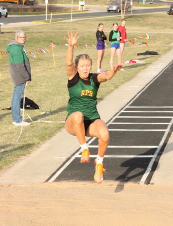 For the third straight meet, RPH junior Aubry Boldt set or reset a program record. Leaping 37’2 ½”, Boldt reset her own RPH Triple Jump mark. She also won the 100-meters, 100-meter hurdles, and Long Jump competitions at a home meet, helping RPH’s girls take first at said event. Photo by Paul Trende