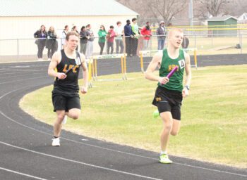 LFCMC’s Jaxon Huntington and RPH’s Matthew Sprague run the final leg of the 4x800 closely together at the RPH track and field meet. RPH took first and LFCMC second in said race. Photo by Paul Trende