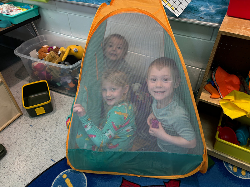 Camping during dramatic play time.
