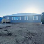 The completed Eitzen Habitat for Humanity house is a nice addition to the town. Photo by Charlene Corson Selbee