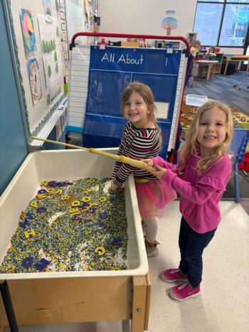 Sylvi Olson and Blair Anderson catching letters in the sensory table during play time in preschool at R-P Schools. Photo submitted