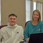 Jacqui VanMinsel of Spring Grove Communications has been working side-by-side with Spring Grove senior Jacob Hernandez to establish the Spring Grove Digital Assist program. Photo by Charlene Corson Selbee