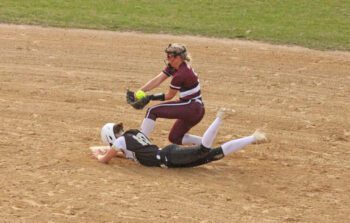 Caledonia’s Paizley Lange slides into second base ahead of the force by Chatfield’s Brittin Ruskell, a hustle play that allowed a bases loaded run to score. Caledonia, #5 in AA, topped the Gophers, #9 in AA, by 4-0 final in a key TRC matchup of East and West TRC division leaders. Photo by Paul Trende