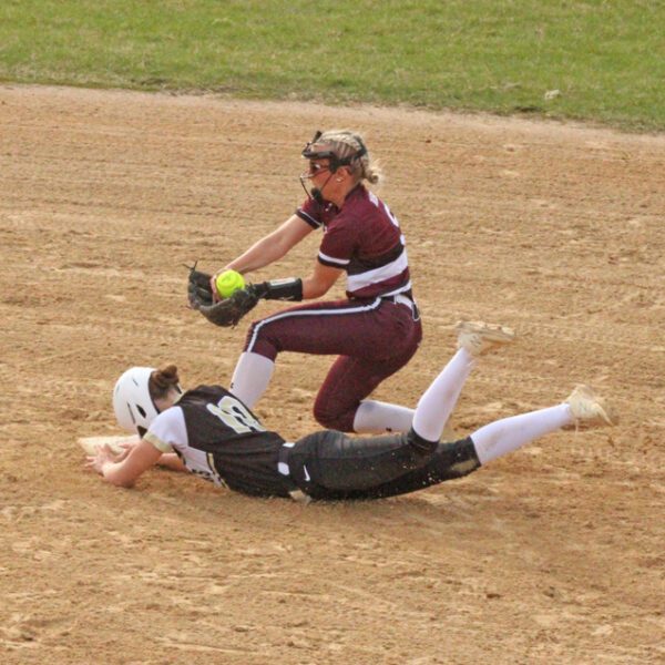 Caledonia’s Paizley Lange slides into second base ahead of the force by Chatfield’s Brittin Ruskell, a hustle play that allowed a bases loaded run to score. Caledonia, #5 in AA, topped the Gophers, #9 in AA, by 4-0 final in a key TRC matchup of East and West TRC division leaders. Photo by Paul Trende