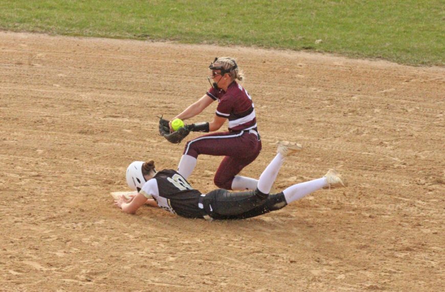 Caledonia’s Paizley Lange slides into second base ahead of the force by Chatfield’s Brittin Ruskell, a hustle play that allowed a bases loaded run to score. Caledonia, #5 in AA, topped the Gophers, #9 in AA, by 4-0 final in a key TRC matchup of East and West TRC division leaders. Photo by Paul Trende