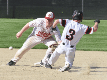 Ezra Konkel steals second base while defended by Houston second baseman Coltin Groth. The Spring Grove freshman (wearing #3) batted 3 for 3, stole three bases, scored three runs and drove in another during the Lions’ runaway 18-8 road win.” Photo by Lee Epps