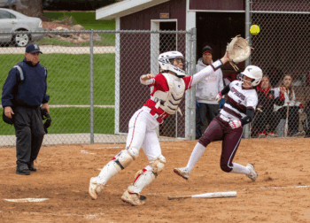 Wabasha-Kellogg’s Lauren Stumpf tries to field a throw home as Chatfield’s Katryn Johnson slides in safely. The #7 in AA Gophers split two with the Falcons, but they (9-2, 13-2) still sit atop the TRC-West standing with Dover-Eyota (6-2, 8-4). Photo by Leif Erickson