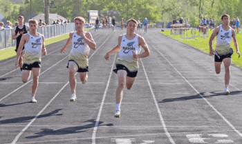 Caledonia/Spring Grove’s Owen Staggemeyer (third place), Eli Staggemeyer (second place), Fischer Wait (first), and Coby Hammell (fifth) all near the finish line of the 100-meters at the Chatfield Invite. Gopher Logan Pearson (fourth) completed the top five. Photo by Leif Erickson