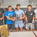 Spring Grove boys 2025 basketball team awardees are, from left: Ben Udstuen, Most Valuable Player; Troy Reinhardt, co-Defensive Player of the Year; Zach Brumm, co-Defensive Player of the Year; Lyric Stadtler, Rookie of the Year and Most Improved; and Caleb Eiken, Lion Award. Photo by Lee Epps