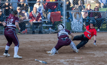 In one of the game’s key plays, courtesy of an outfield assist by Kendyl Nolte, Chatfield catcher Makenna Dornack tags Cannon Falls’ Rihanna Gomes out at home plate in the top of the sixth inning, preserving the Gophers 5-4 lead. Photo by Leif Erickson