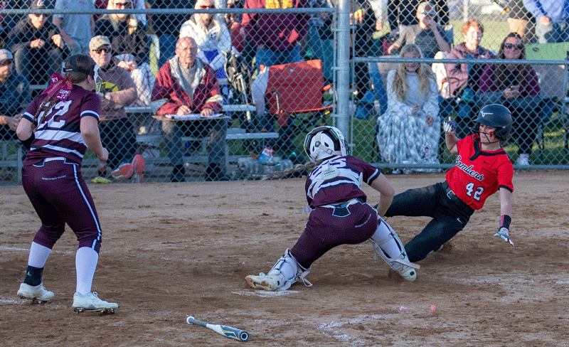 In one of the game’s key plays, courtesy of an outfield assist by Kendyl Nolte, Chatfield catcher Makenna Dornack tags Cannon Falls’ Rihanna Gomes out at home plate in the top of the sixth inning, preserving the Gophers 5-4 lead. Photo by Leif Erickson