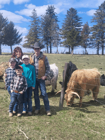 The Burroughs family with their small herd of cattle. Photo by Hannah Wingert