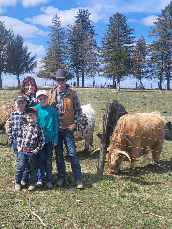 The Burroughs family with their small herd of cattle. Photo by Hannah Wingert