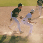 After an infield hit, Rushford-Peterson’s Cayden Lea tries to catch Caledonia’s Jack Schmitz leaning off third base (to no avail). The play was part of a seven-run sixth that led to a 13-3 Caledonia win, as the Warriors (14-6) posted their second straight 4-1 week. Photo by Paul Trende